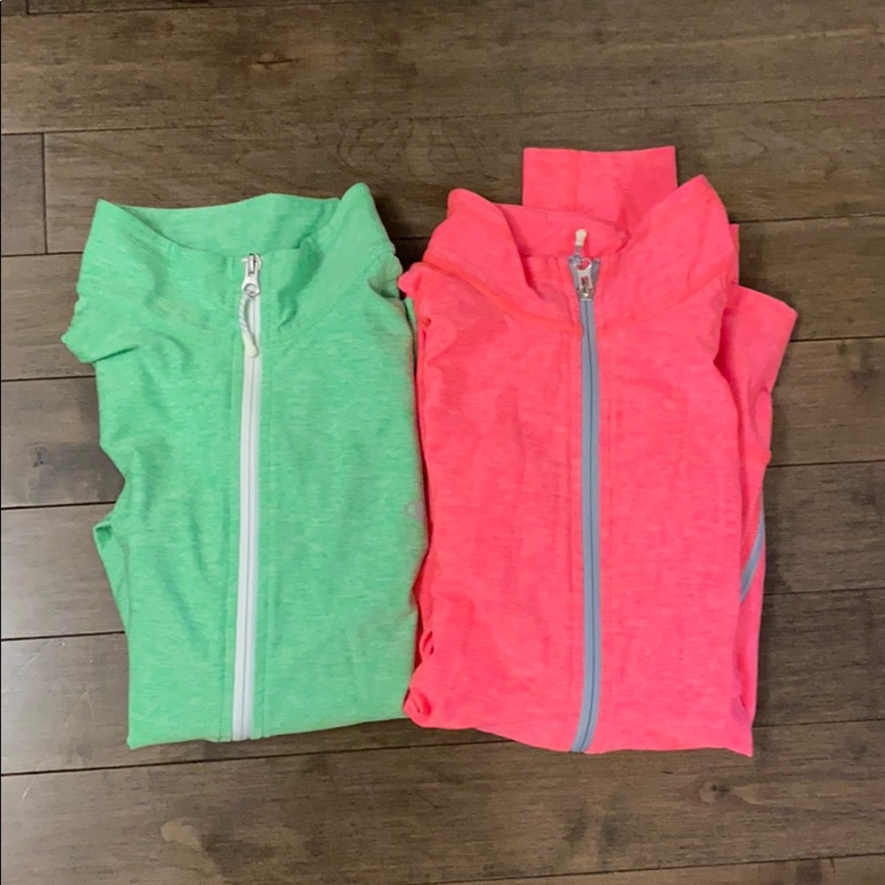 2 Champion zip ups